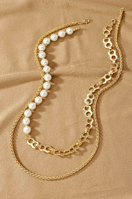 TWO ASYMMETRIC PEARL NECKLACE